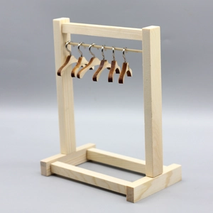 Miniature wooden clothing rack with five hangers for 18-inch doll clothes display