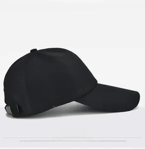 Side view of black canvas baseball cap showing long brim and metal adjustment buckle