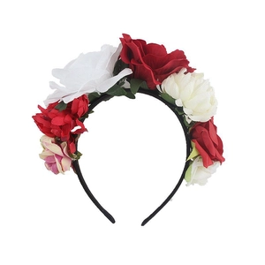 Detail of bohemian floral headband with white peonies and red fabric roses on black base