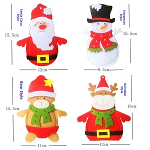 Detail view of felt Christmas cutlery holders with dimensions for Santa and Elk designs