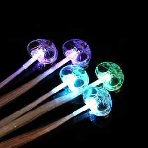 Colorful LED fiber optic hair braids glowing in purple blue green white for parties