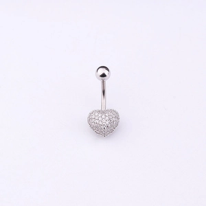Close-up of a silver-toned 316L stainless steel navel ring with a micro-pave zircon heart