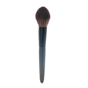 Concave foundation brush with synthetic brown bristles and a sleek black handle