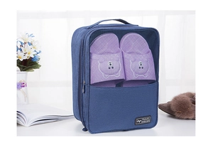 Detail of travel shoes bag with breathable mesh and top handle for storage