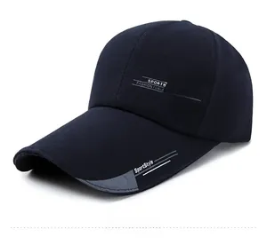 Detail view of navy blue baseball cap side print and grey brim patchwork design