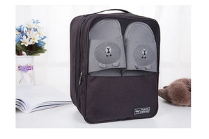 Detail of black cationic oxford travel shoe bag with mesh window and carry handle