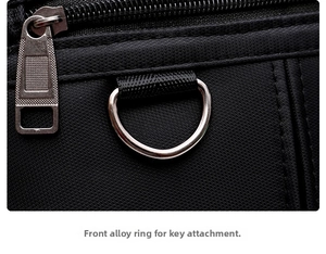 Detailed macro of the durable Oxford fabric bag featuring an alloy D-ring for keys