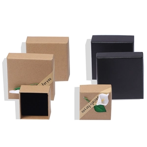 Square kraft and black jewelry gift boxes with decorative bands for necklaces and rings