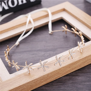 Elegant gold starfish headband with rhinestones and white silk ribbon for bridal styling