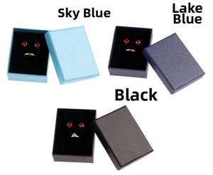 Three-color kraft paper jewelry boxes in sky blue, lake blue, and black with black velvet lining
