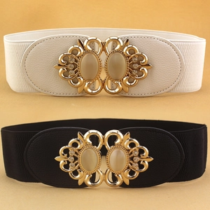 Elastic waist belt with dual cat's eye stone buckle in black and white colors