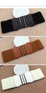 Detail showing elastic wide belts in black, brown and cream with metal buckles
