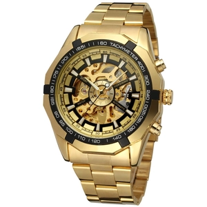 Macro detail of golden skeleton mechanical watch with tachymeter bezel and automatic movement