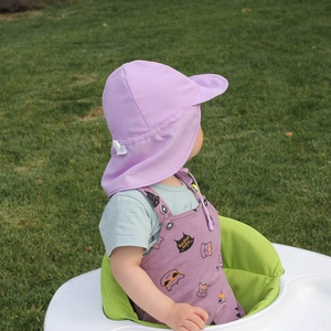 Detail of light purple baby sun hat featuring a protective neck flap and adjustable chin strap