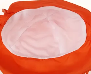 Detail of breathable white mesh lining on orange sun hat showing quick-dry fabric