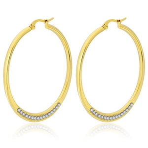 Detail of large gold hoop earrings with sparkling white crystals on the outer curve