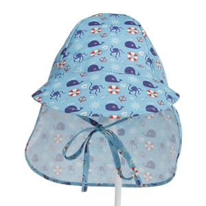 Detail of baby sun hat with neck flap featuring nautical whale and anchor print