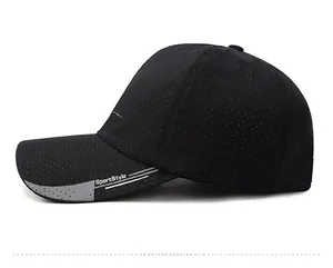 Close-up of black breathable laser-cut mesh fabric and printed logo on the sports cap