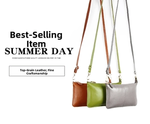 Three leather crossbody bags in brown, green, and grey with fine litchi grain texture