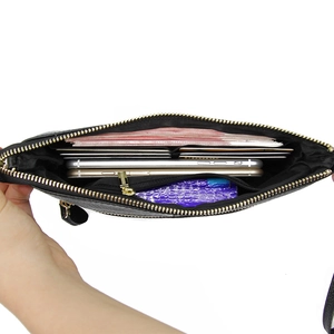 Slim black leather envelope handbag with multiple card slots and large internal capacity