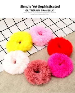 Set of six fluffy faux rabbit fur scrunchies in vibrant candy colors and plush texture