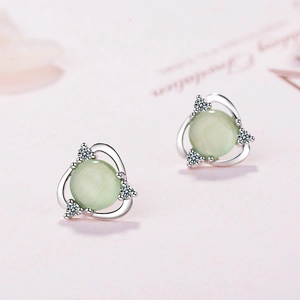 Exquisite cat eye stone flower stud earrings with zircon accents in silver setting