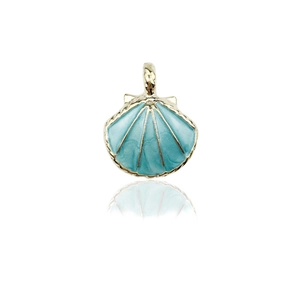 Golden seashell charm with blue enamel detail, jewelry DIY accessory in studio lighting