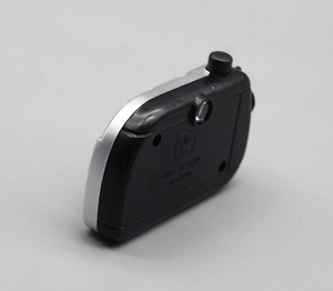 Close-up of black plastic doll umbrella handle with silver trim and NO:5006 model marking