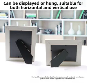 Detail view of vintage photo frame back showing support stand for horizontal and vertical use