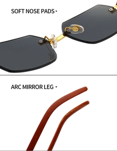 Detail of soft nose pads and curved leopard head temple tips on rimless sunglasses