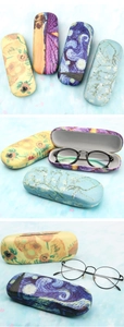 Detail showing various oil painting eyeglass cases featuring Van Gogh starry night art