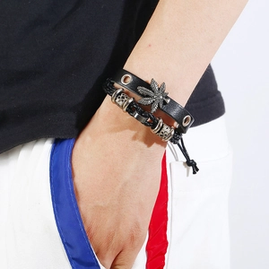 Men's punk leather bracelet set featuring alloy maple leaf charm and braided cord on wrist