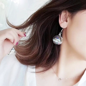 Elegant long iridescent clear glass ball drop earrings with shiny silver hooks