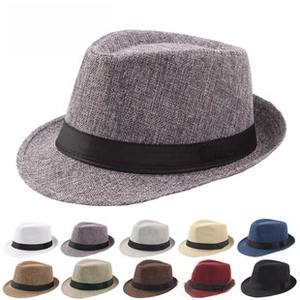 Détail de la texture du chapeau jazz tissé avec ruban noir et diverses options de couleurs