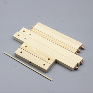 Detail of DIY 18-inch doll furniture kit with polished natural wood pieces and dowels
