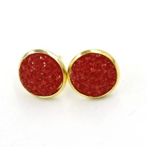 Detailed view of 12mm red druzy stud earrings with elegant gold plated metal edges