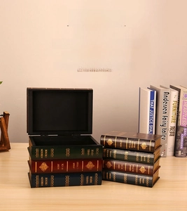 Macro detail of vintage book-shaped storage box with classic literature spine titles