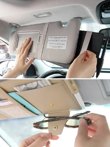 Detailed view of beige leather car visor organizer with card slots and sunglasses holder