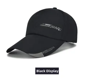 Detail view of the side embroidery and color-block brim on a black sports baseball cap