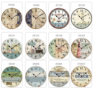 Collection of twelve vintage wooden silent wall clocks with nautical and coastal themes