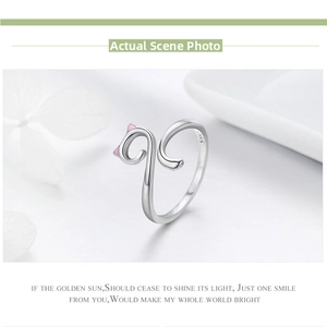 Close-up of S925 sterling silver cat ring featuring pink enamel ears and open band