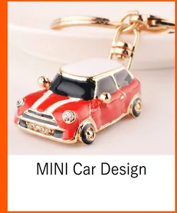 Close-up of a red metal MINI car keychain with enamel details and sparkling rhinestones