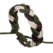 Close-up of handmade woven bracelet featuring brown, green, and cream adjustable cords