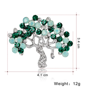 Silver tree brooch with green crystals and rhinestones, dimensions 4.1cm by 3.4cm