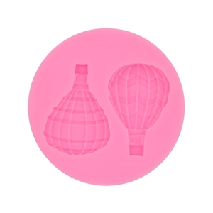Pink silicone cake mold with four hot air balloon designs for DIY fondant and chocolate