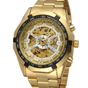 Detailed macro shot of the golden skeleton dial and black tachymeter bezel on mechanical watch
