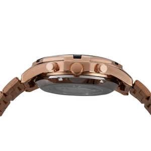 Detail view of the rose gold automatic watch case with three functional side crowns