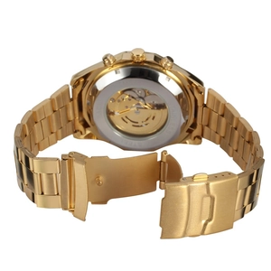 Gold stainless steel watch detail showing transparent case back and folding clasp mechanism