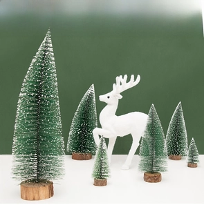 Miniature snowy pine Christmas tree set with white reindeer and natural wood bases