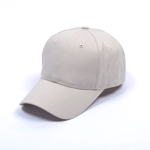 Detail of beige cotton twill baseball cap showing six-panel structure and curved brim
